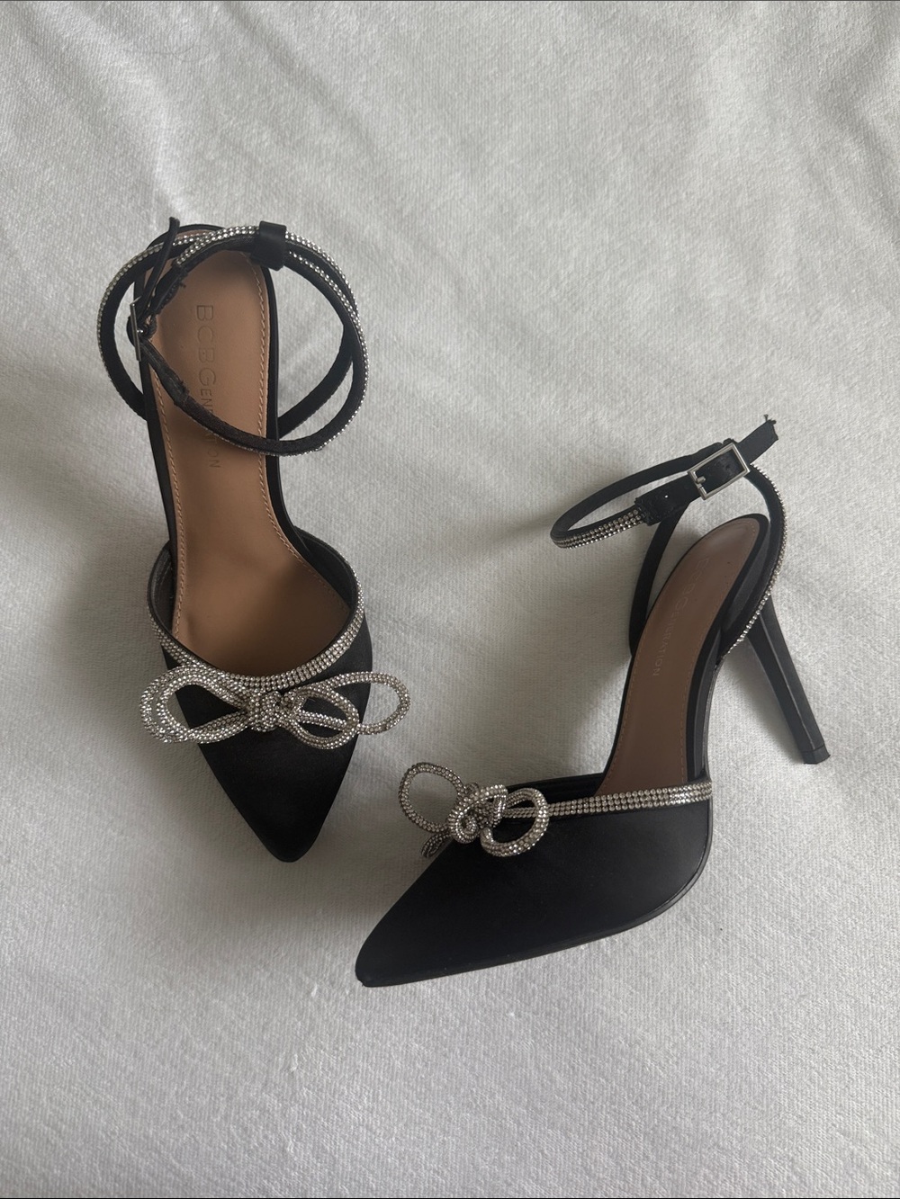 BCBGeneration Black Pointed Toe Ankle-Strap Heels with Crystal Bow